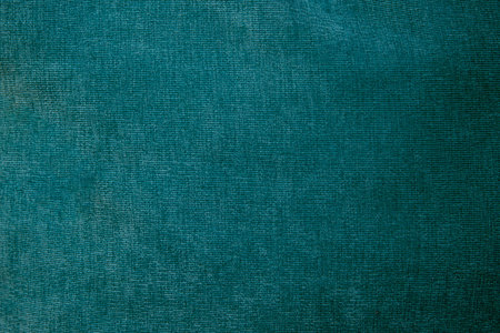 The texture of a blue soft fabric. Upholstery of furniture.