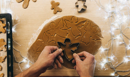 Set 18. Men's hands knead the dough. The chef prepares ginger. Christmas cookies on the table with cooking flour.の写真素材