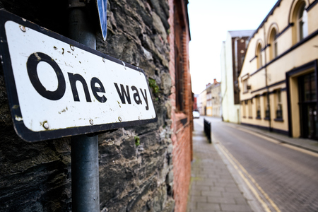 One way road sign on a road in Derry Northern Irelandの写真素材