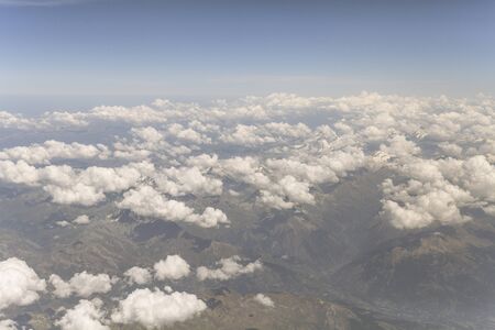 Aerial of a cloudscape above the Alps.の写真素材