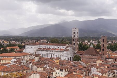 Chiesa San Frediano rising above the historic centre of Lucca.の写真素材
