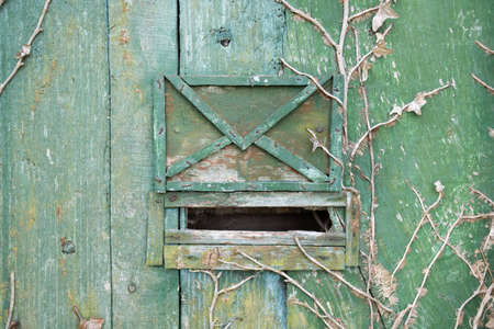 Old mailbox on wooden door. vintage backgroundの写真素材