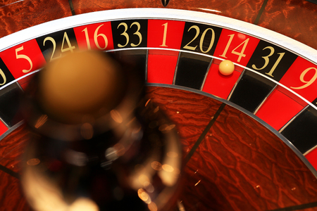 Classic casino roulette wheel with ballの写真素材