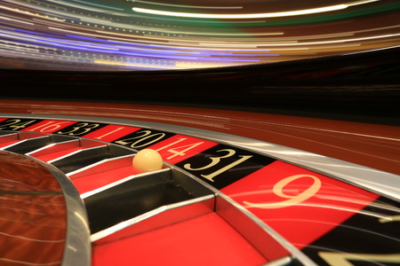 Classic casino roulette wheel with ballの写真素材