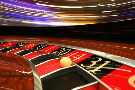Classic casino roulette wheel with ballの写真素材
