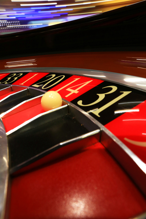 Classic casino roulette wheel with ballの写真素材
