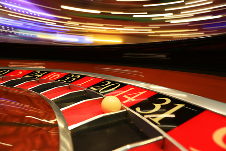 Classic casino roulette wheel with ballの写真素材