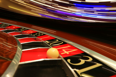 Classic casino roulette wheel with ballの写真素材