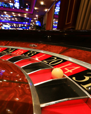Classic casino roulette wheel with ballの写真素材