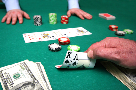 Card player checks handの写真素材