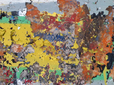 Old wall with worn off paintの写真素材