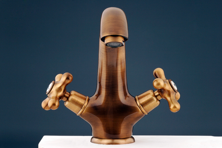 Bronzy metal tap of retro design. Faucetの写真素材