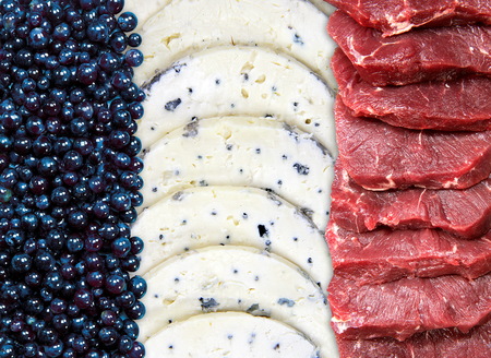 french flag, collage from blackcurrants, blue cheese and fresh meatの写真素材