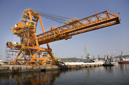 Big industrial crane at a harborの写真素材