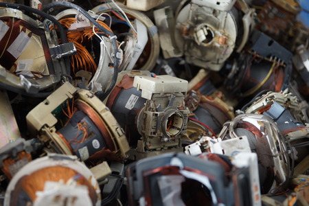 Pile of plastic and metal trash, junk, backgroundの写真素材
