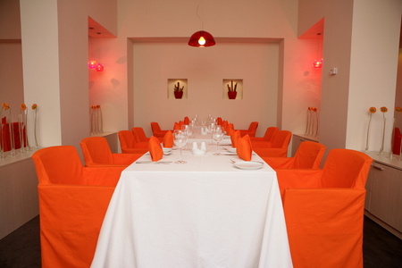 Long table setting in restaurantの写真素材