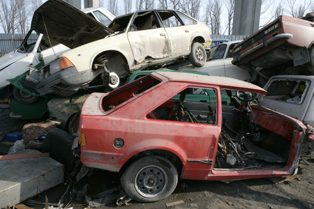 Crushed cars in junkyardの写真素材