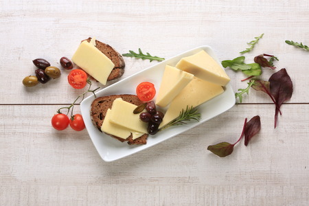 Slices of cheese arranged in a specific wayの写真素材