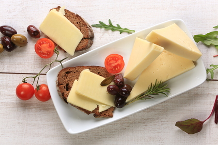 Slices of cheese arranged in a specific wayの写真素材