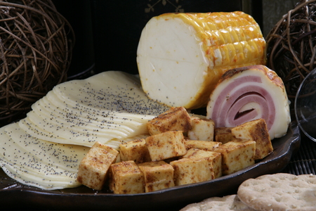 Various types of cheese next to each otherの写真素材