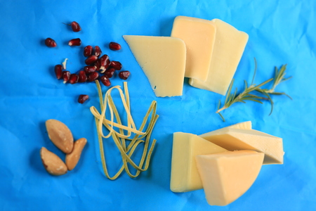 Slices of cheese arranged in a specific wayの写真素材