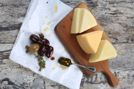 Slices of cheese arranged in a specific wayの写真素材