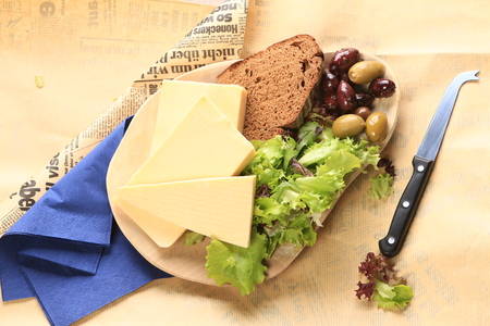 Slices of cheese arranged in a specific wayの写真素材