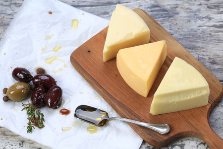 Slices of cheese arranged in a specific wayの写真素材