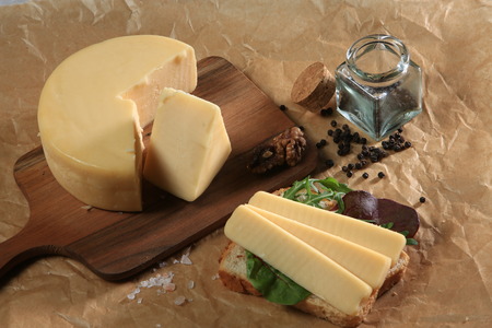 Slices of cheese arranged in a specific wayの写真素材
