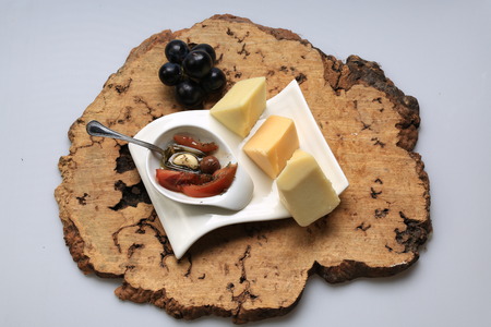 Slices of cheese arranged in a specific wayの写真素材