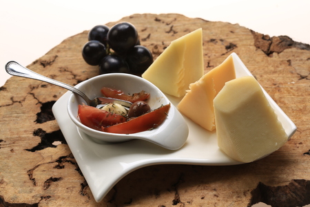 Slices of cheese arranged in a specific wayの写真素材