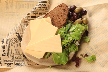 Slices of cheese arranged in a specific wayの写真素材