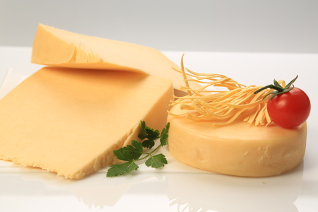 Different types of cheese slicesの写真素材