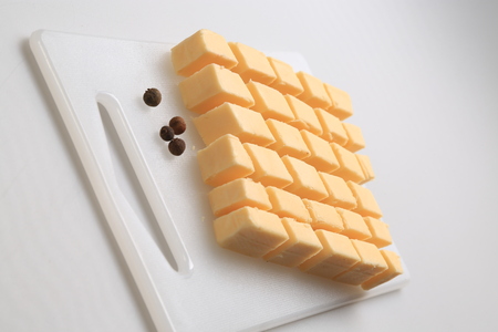 Different types of cheese slicesの写真素材