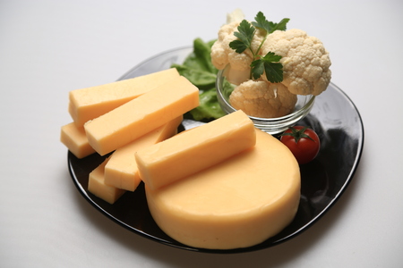 Different types of cheese slicesの写真素材