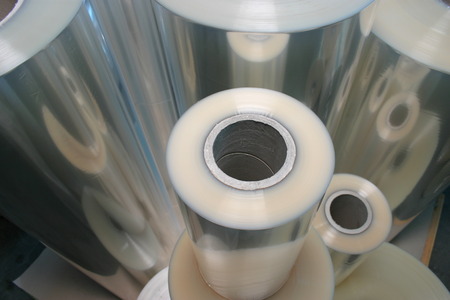 A shot of different sized plastic foil rollsの写真素材