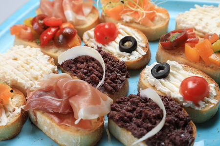 A set of many different small sandwichesの写真素材