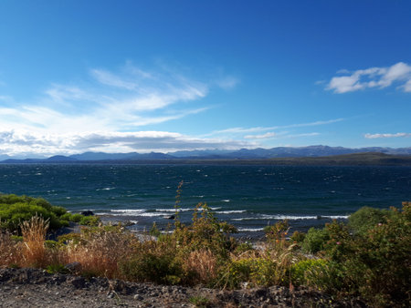 Water Landscape With Clouds Over The Andes