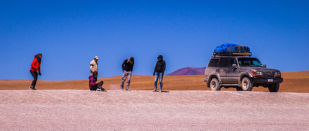 A Jeep Tour through the Bolivian Salt Desert Uyuni is a popular touristic activity on the Altiplano...