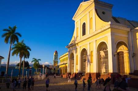 Trinidad, Cuba - December 29, 2015: Main square with colonial cathedral and clock towerのeditorial素材