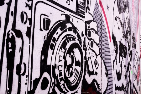 Bogota, Colombia on December 14, 2015: Street art artwork by artist Toximano depicting an old polaroid cameraのeditorial素材