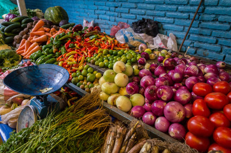 Fresh vegetables with old scale sold on Otavalo market, Ecuadorの写真素材