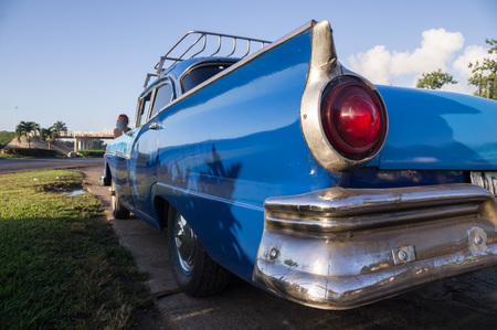 Blue oldtimer taxi rear view in Cubaの写真素材
