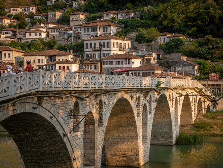 Berat, Albania on August 27, 2019: People standing on Gorica bridge in the town of a thousand...