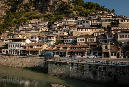 Berat, Albania on August 27, 2019: Town of one thousand windows and white Ottoman houses over Osum river, Berat, Albaniaのeditorial素材