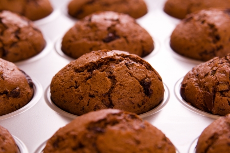 Freshly baked chocolate muffins closeup shoot の写真素材