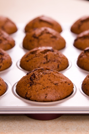 Freshly baked chocolate muffins closeup shoot の写真素材