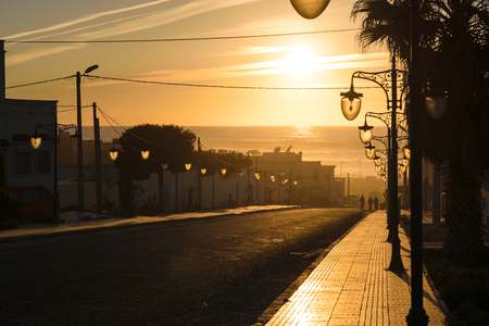 Last sunlight hits a street, Aglou Plage, Moroccoの写真素材