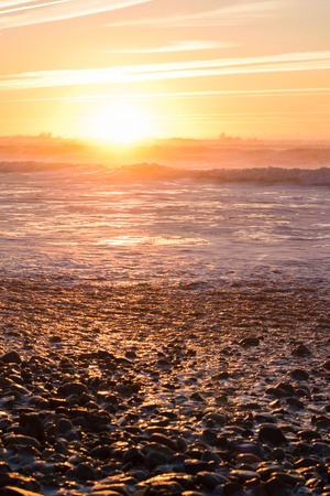 Sunset and reflections at the beach, Moroccoの写真素材