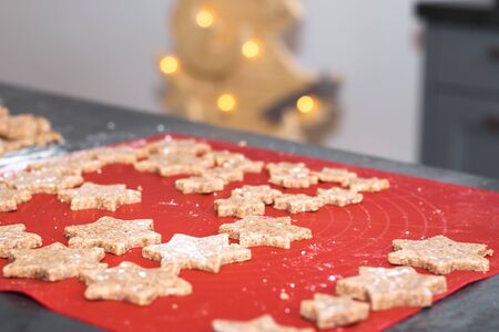 Star shaped cinnamon christmas cookies are ready for the oven.の写真素材